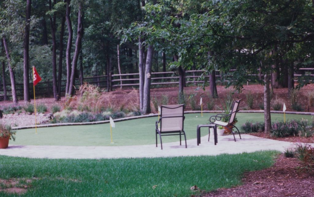 lawn furniture overlooking small golf course