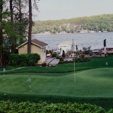 golfing turf with lake in background