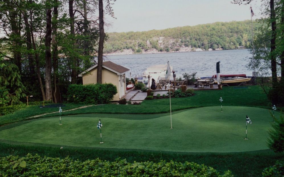 golfing turf with lake in background